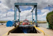 A Goodchild Marine boat docked in the water.