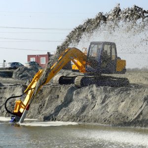 A Goodchild Marine yellow and blue excavator.