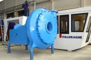 A Goodchild Marine machine is sitting in front of a building.