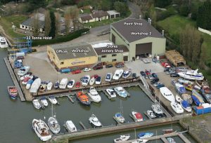 An aerial view of the Goodchild Marine marina with many boats docked.