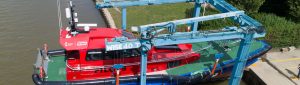 A Goodchild Marine boat docked at a dock.