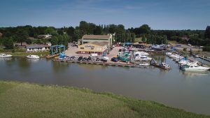 A Goodchild Marine boat docked in a body of water.