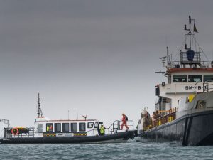 A Goodchild Marine boat gracefully sailing through the water.