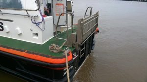 A Goodchild Marine boat docked in a body of water.