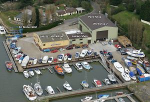 An aerial view of Goodchild Marine, a marina with boats docked.