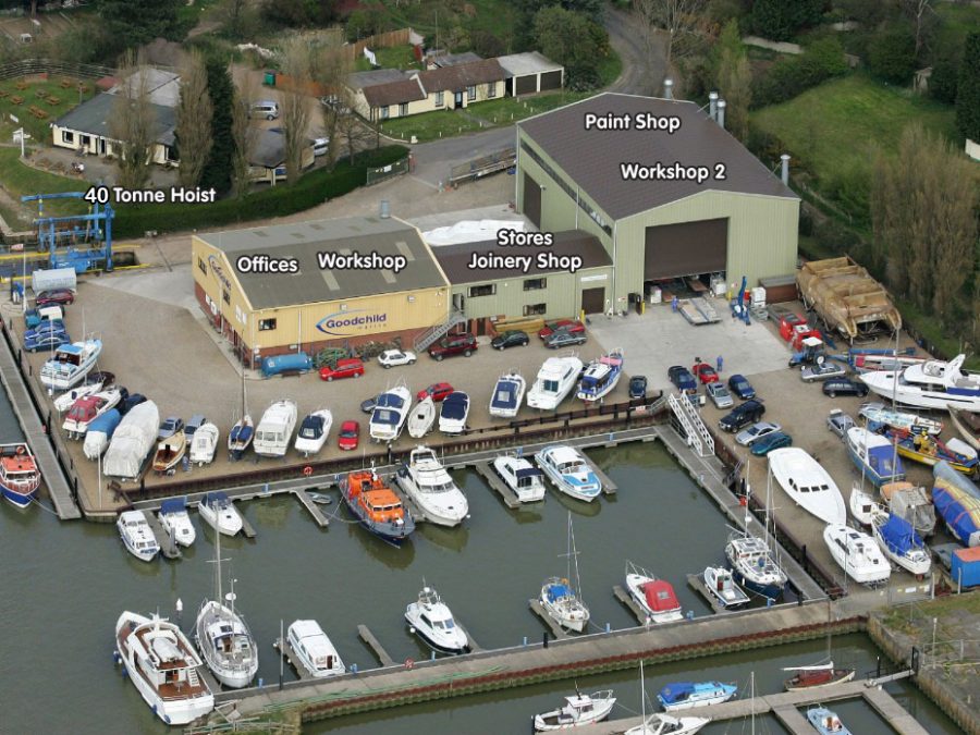 An aerial view of Goodchild Marine, a marina with boats docked.